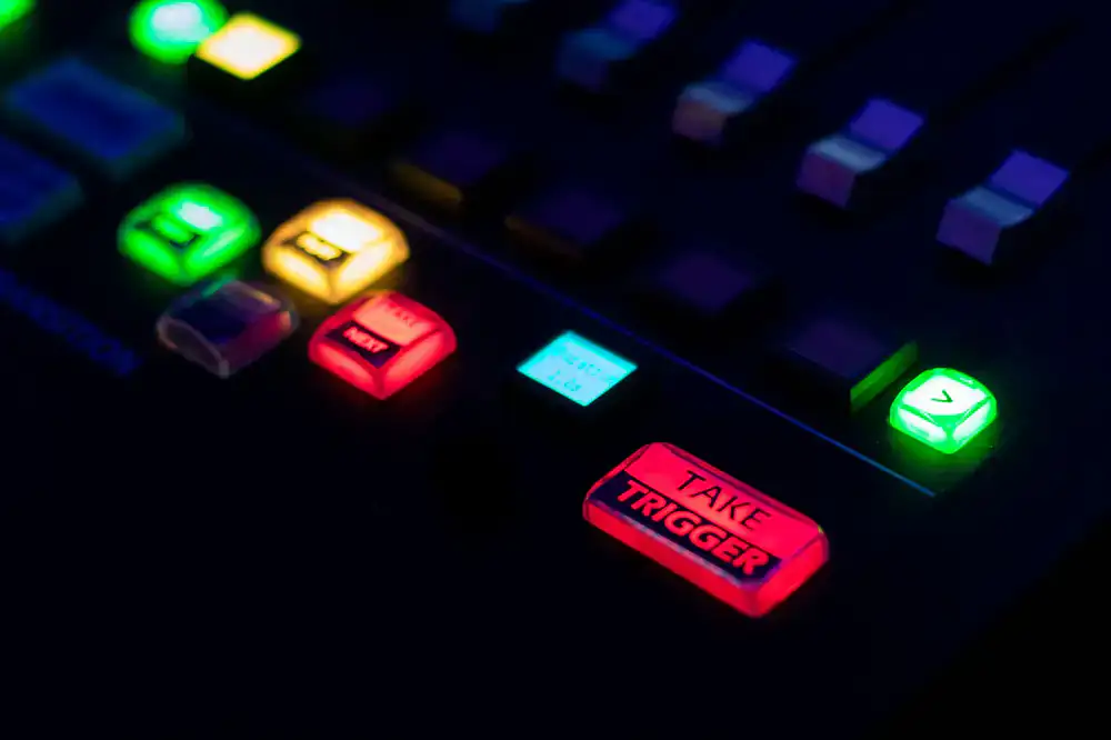 Glowing buttons and turning gears on a display panel